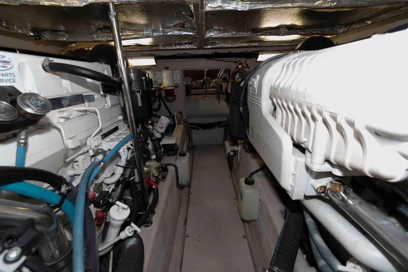 Slide: The Image of Engine room of 2008 Sea Ray 52 Sedan Bridge yacht, showcasing mechanical components. - 40