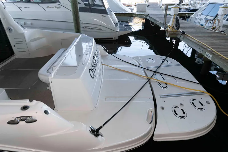 Slide: The Image of 2008 Sea Ray 52 Sedan Bridge yacht docked at marina, rear view. - 6