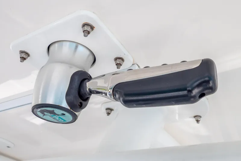 Slide: The Image of Close-up of a 2015 Intrepid 400 Center Console boat handle mechanism. - 57