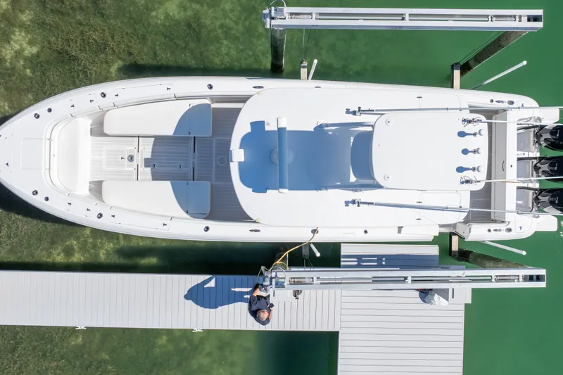 Slide: The Image of Overhead view of 2015 Intrepid 400 Center Console docked in clear water. - 6