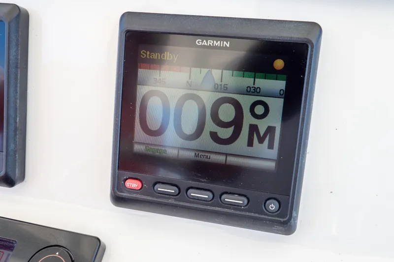 Slide: The Image of Garmin GPS display on 2015 Intrepid 400 Center Console showing speed. - 73