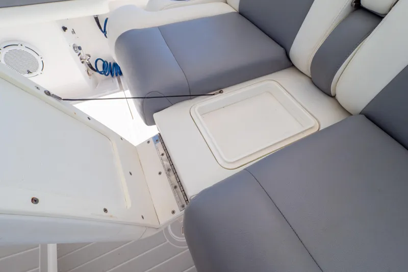 Slide: The Image of 2015 Intrepid 400 Center Console boat dashboard with Florida registration sticker. - 81