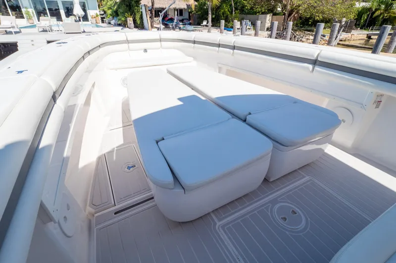 Slide: The Image of 2015 Intrepid 400 Center Console anchor compartment with winch and chain. - 94