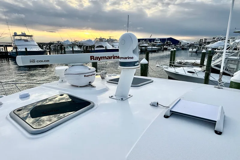Slide: The Image of Boston Whaler 345 Conquest Pilothouse 2014 with Raymarine equipment at marina during sunset. - 24