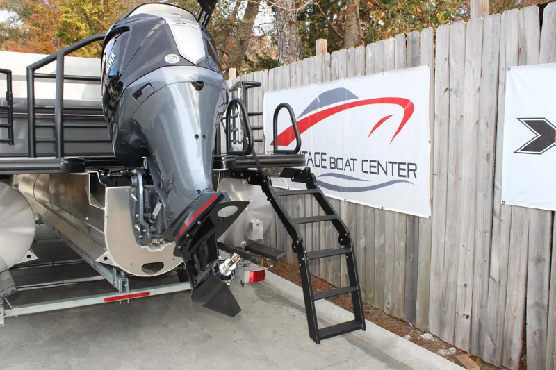 Slide: The Image of 2026 Starcraft EXS 3 Q boat with Yamaha outboard motor at Heritage Boat Center. - 14