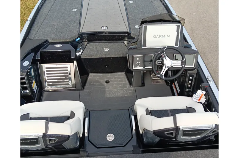 Slide: The Image of 2026 Ranger Z521R Cup-Equipped boat interior with Garmin navigation system and dual seating. - 17