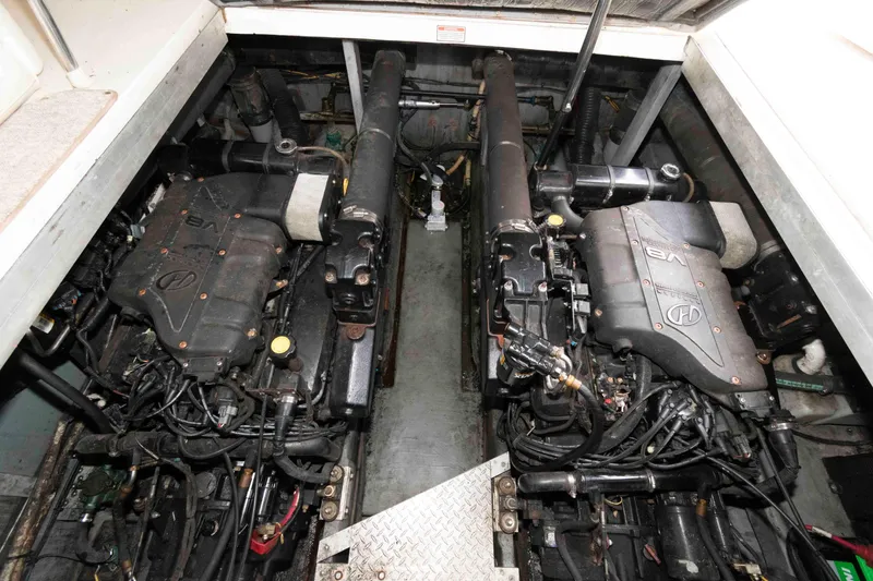 Slide: The Image of Engine room of 1999 Sea Ray 370 Sundancer with twin V8 engines. - 20