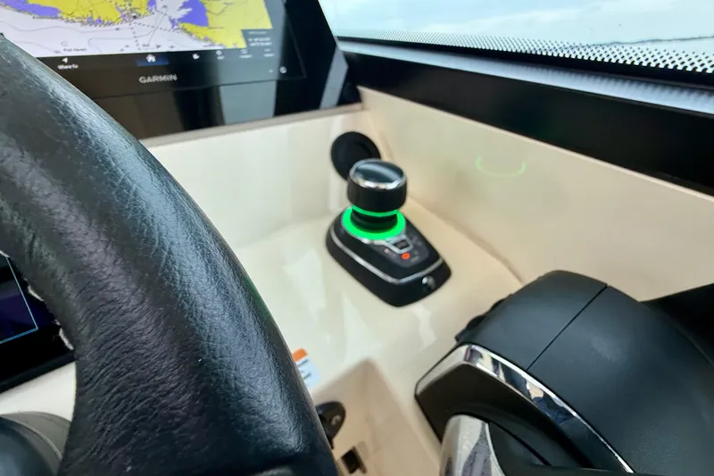 Slide: The Image of 2023 Scout 350 LXZ helm with Garmin display and joystick control. - 19