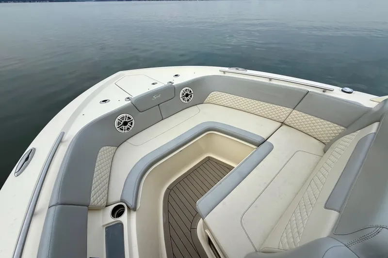 Slide: The Image of Luxurious seating area on 2023 Scout 350 LXZ boat, featuring elegant upholstery and spacious design. - 27