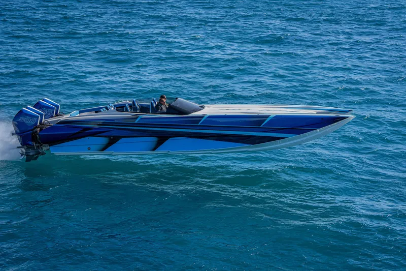 Slide: The Image of 2026 Nor-Tech 4000 Super Catamaran cruising on blue ocean waters. - 108
