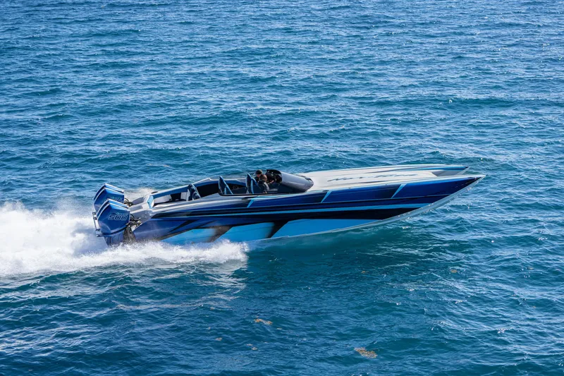 Slide: The Image of 2026 Nor-Tech 4000 Super Catamaran speeding on open water. - 124