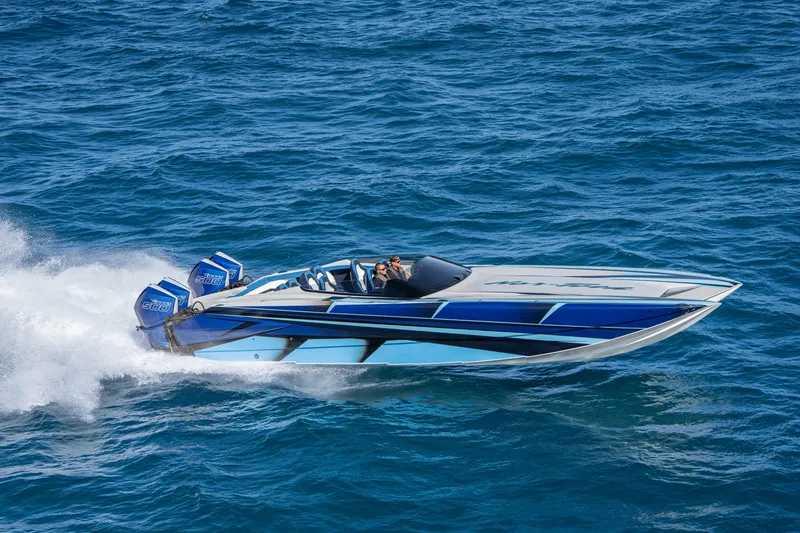Slide: The Image of 2026 Nor-Tech 4000 Super Catamaran speeding on ocean waters. - 141