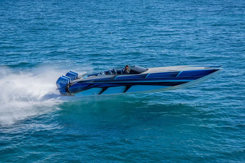 Slide: The Image of 2026 Nor-Tech 4000 Super Catamaran speeding on open water. - 158