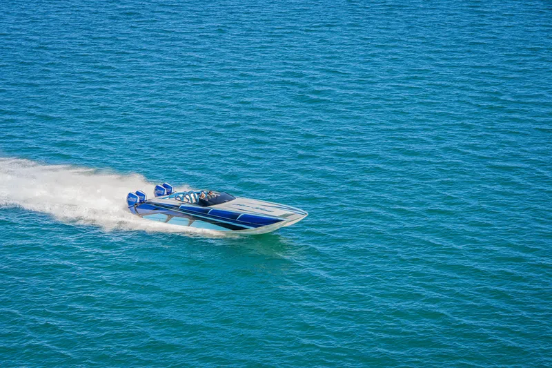 Slide: The Image of 2026 Nor-Tech 4000 Super Catamaran speeding on open water. - 162