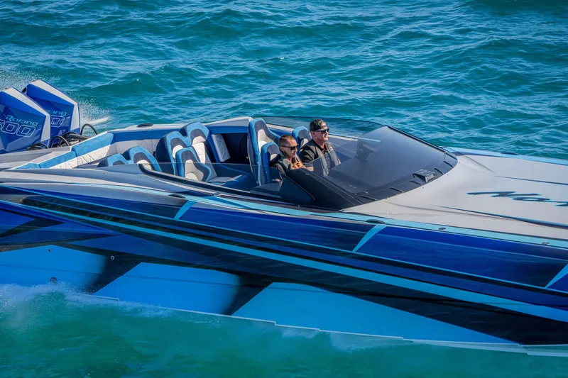 Slide: The Image of 2026 Nor-Tech 4000 Super Catamaran cruising on blue ocean waters. - 178