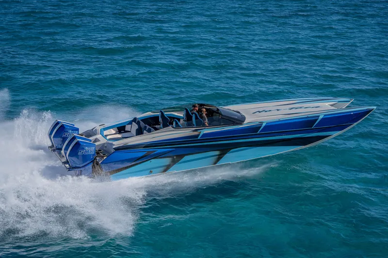 Slide: The Image of 2026 Nor-Tech 4000 Super Catamaran speeding on ocean waters. - 179