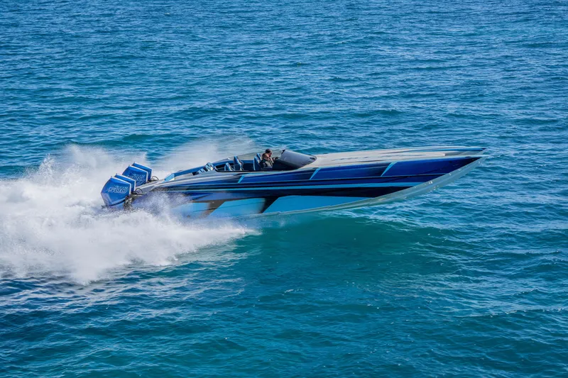 Slide: The Image of 2026 Nor-Tech 4000 Super Catamaran speeding on open water. - 187