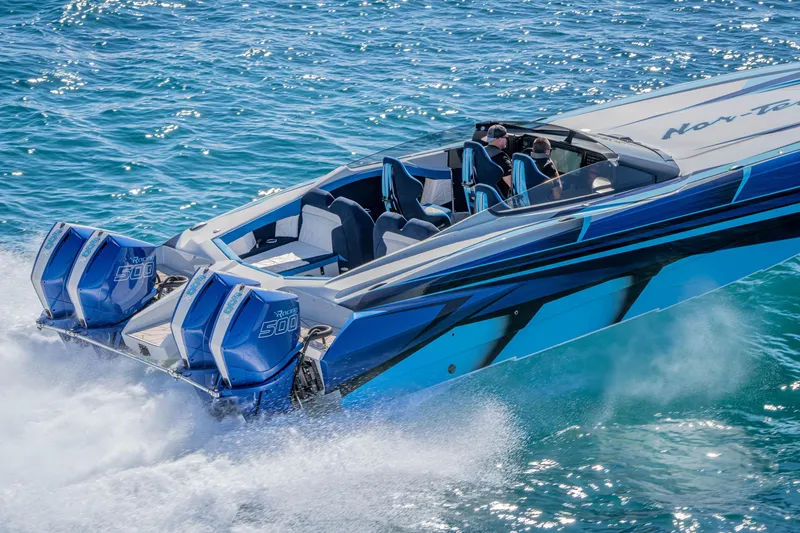 Slide: The Image of 2026 Nor-Tech 4000 Super Catamaran speeding on blue ocean waters. - 207