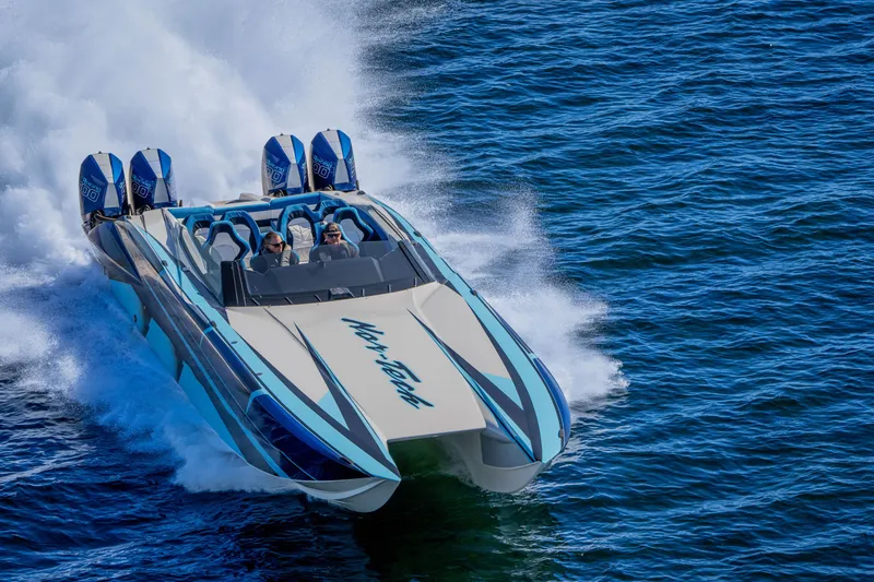 Slide: The Image of 2026 Nor-Tech 4000 Super Catamaran speeding on ocean waters. - 217