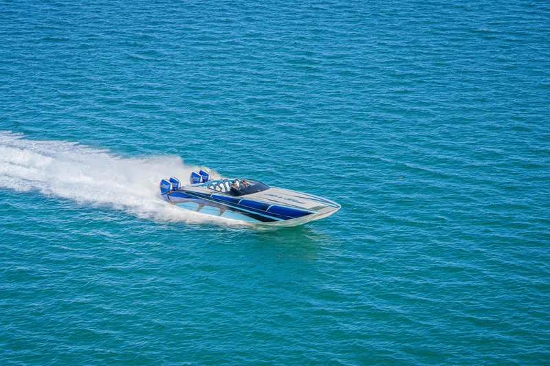 Slide: The Image of 2026 Nor-Tech 4000 Super Catamaran speeding on open water. - 33