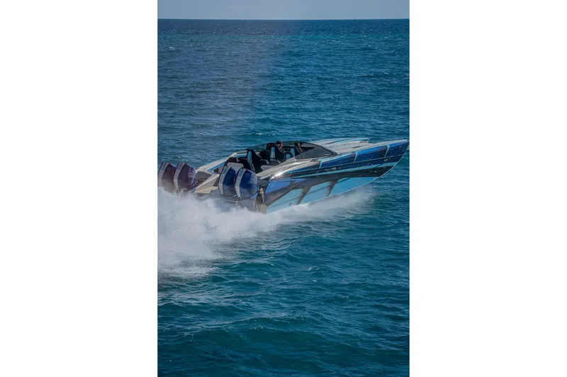 Slide: The Image of 2026 Nor-Tech 4000 Super Catamaran speeding on open ocean waters. - 96