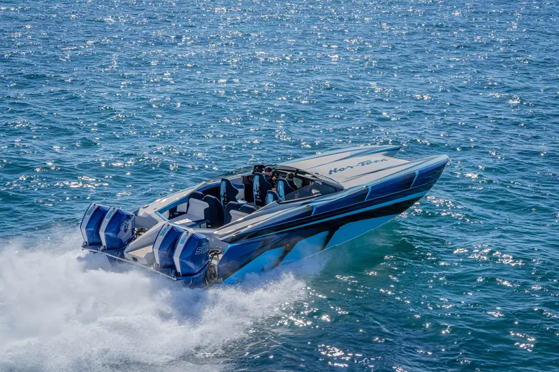 Slide: The Image of 2026 Nor-Tech 4000 Super Catamaran cruising on sparkling blue ocean waters. - 146