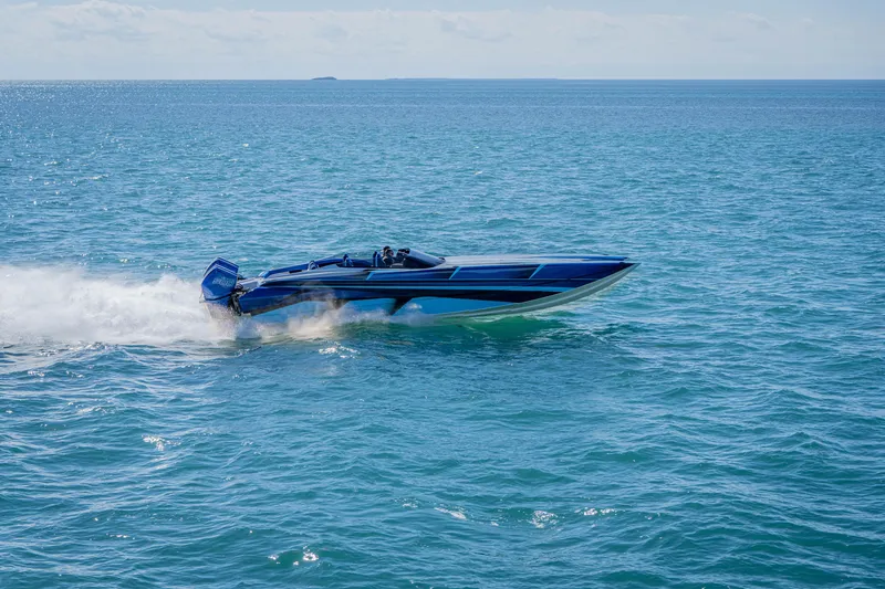 Slide: The Image of 2026 Nor-Tech 4000 Super Catamaran speeding on open water. - 193