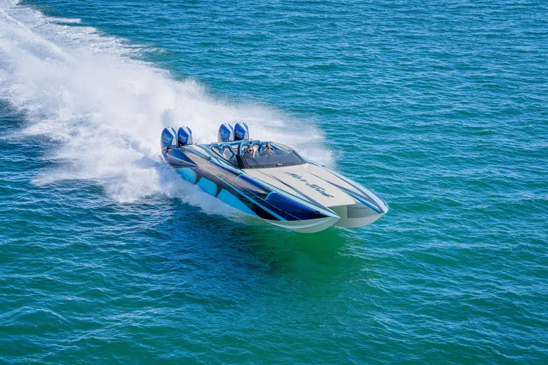 Slide: The Image of 2026 Nor-Tech 4000 Super Catamaran speeding on open water. - 216