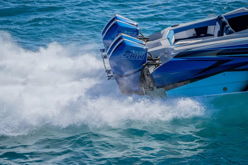 Slide: The Image of 2026 Nor-Tech 4000 Super Catamaran speeding on water with powerful engines. - 41