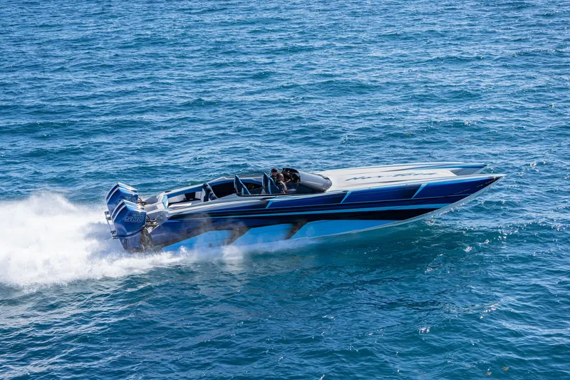 Slide: The Image of 2026 Nor-Tech 4000 Super Catamaran speeding on open water. - 54