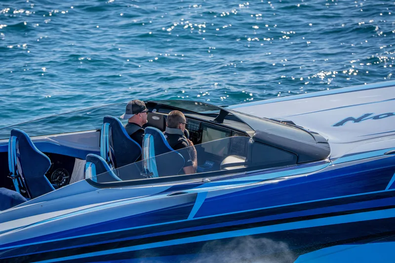 Slide: The Image of 2026 Nor-Tech 4000 Super Catamaran cruising on blue ocean waters. - 59