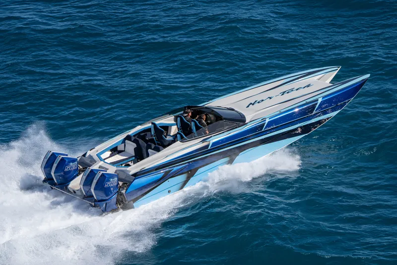 Slide: The Image of 2026 Nor-Tech 4000 Super Catamaran speeding on ocean waters. - 73