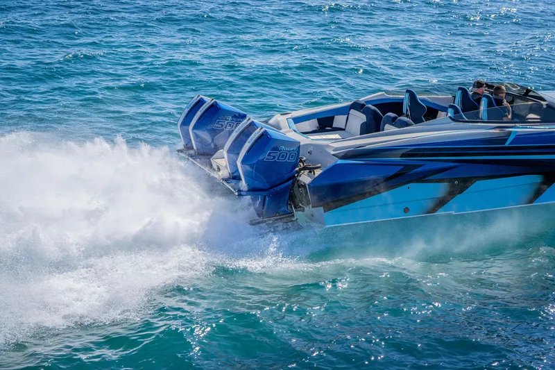 Slide: The Image of 2026 Nor-Tech 4000 Super Catamaran speeding on ocean with powerful engines. - 81