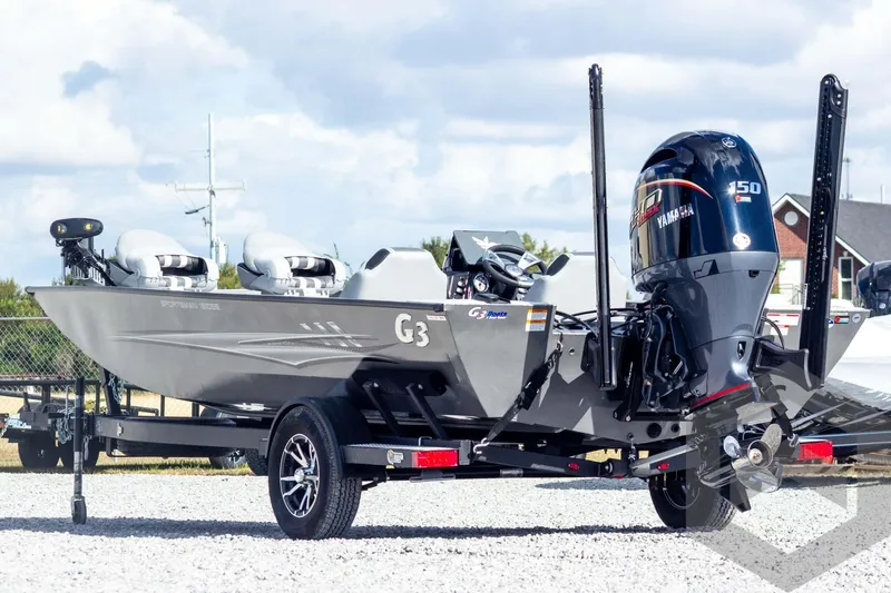 Slide: The Image of 2026 G3 Sportsman 1910 SE boat on trailer with Yamaha outboard motor. - 10