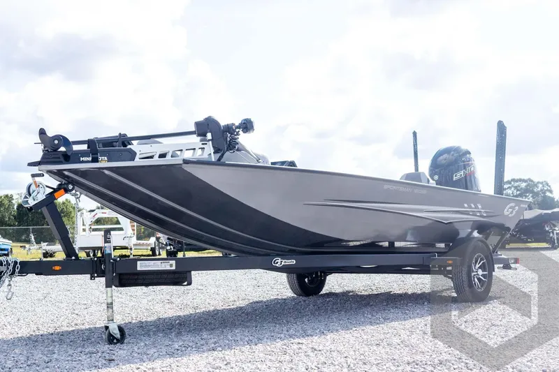 Slide: The Image of 2026 G3 Sportsman 1910 SE boat on trailer, parked outdoors on gravel. - 12