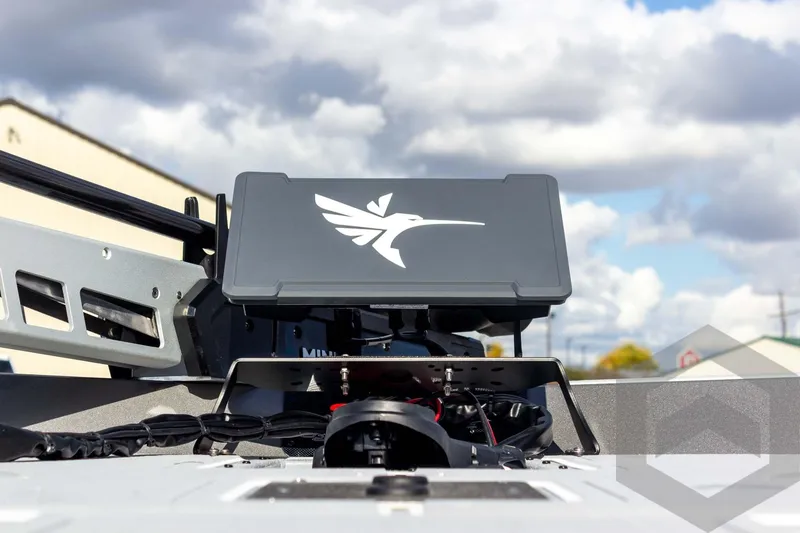 Slide: The Image of 2026 G3 Sportsman 1910 SE boat with advanced navigation system under cloudy sky. - 32