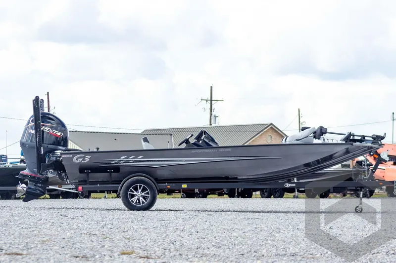 Slide: The Image of 2026 G3 Sportsman 1910 SE boat on trailer, side view, outdoors. - 4