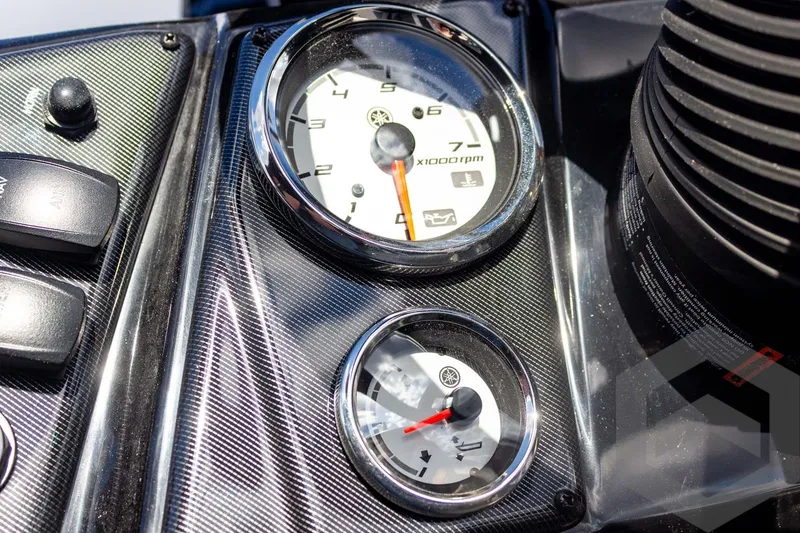 Slide: The Image of Dashboard of 2026 G3 Sportsman 1910 SE with tachometer and fuel gauge. - 42