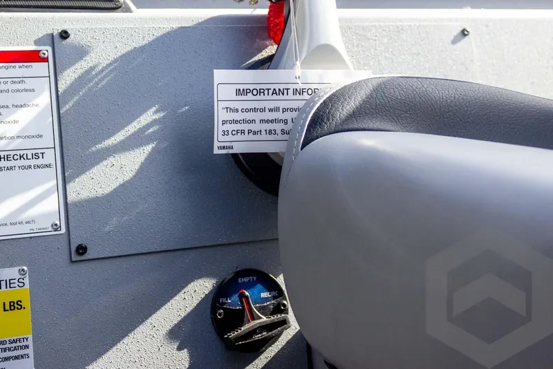 Slide: The Image of 2026 G3 Sportsman 1910 SE dashboard with safety instructions and fuel gauge. - 46