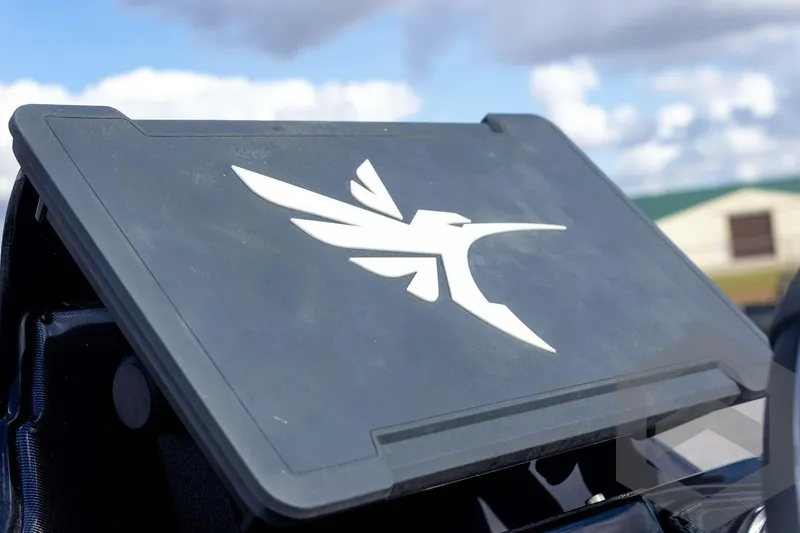 Slide: The Image of 2026 G3 Sportsman 1910 SE logo on a sleek black panel under a cloudy sky. - 47