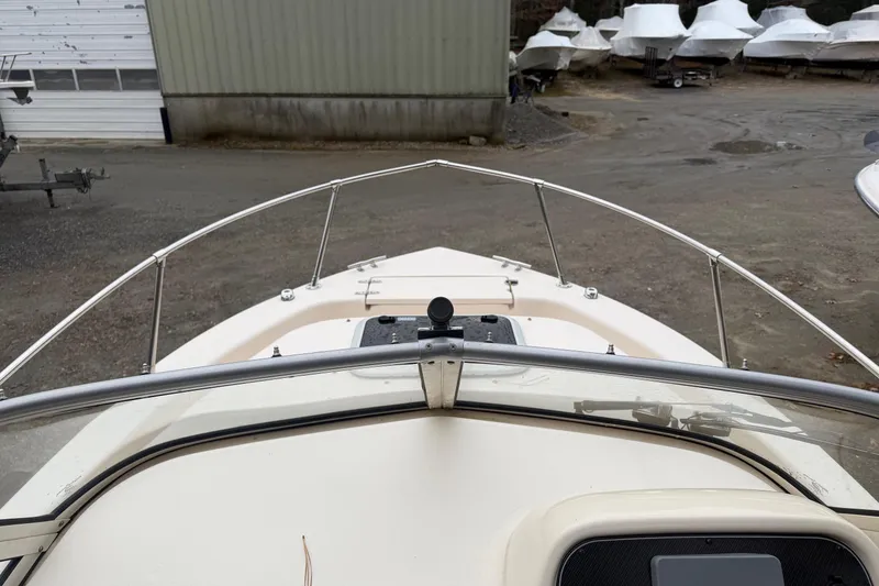 Slide: The Image of 2020 Grady-White Adventure 208 boat bow view in storage yard. - 11