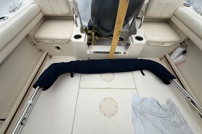 Slide: The Image of Interior of a 2020 Grady-White Adventure 208 boat with seating and storage. - 22