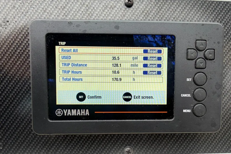 Slide: The Image of Yamaha display on 2020 Grady-White Adventure 208 showing trip data and fuel usage. - 8