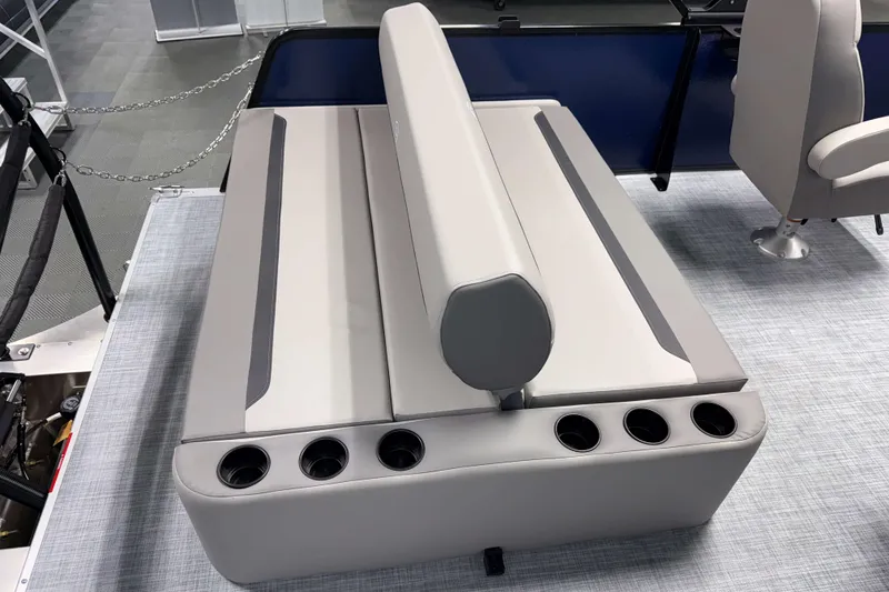 Slide: The Image of Premier 200 Sunscape RL Tritoon 2026 boat seating with cup holders and modern design. - 10