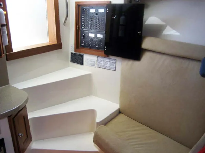 Slide: The Image of Interior of 2005 Albemarle 310 Sport Fisherman with control panel and seating area. - 11