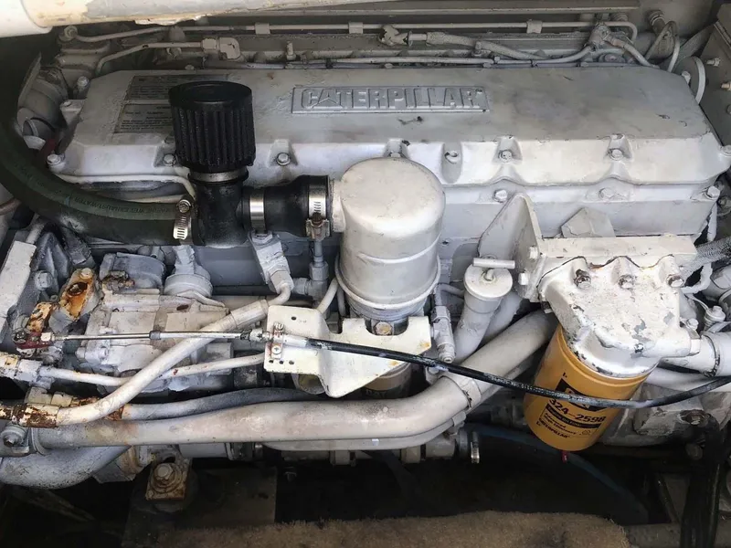 Slide: The Image of Caterpillar engine in a 2005 Albemarle 310 Sport Fisherman boat, showing detailed components. - 19