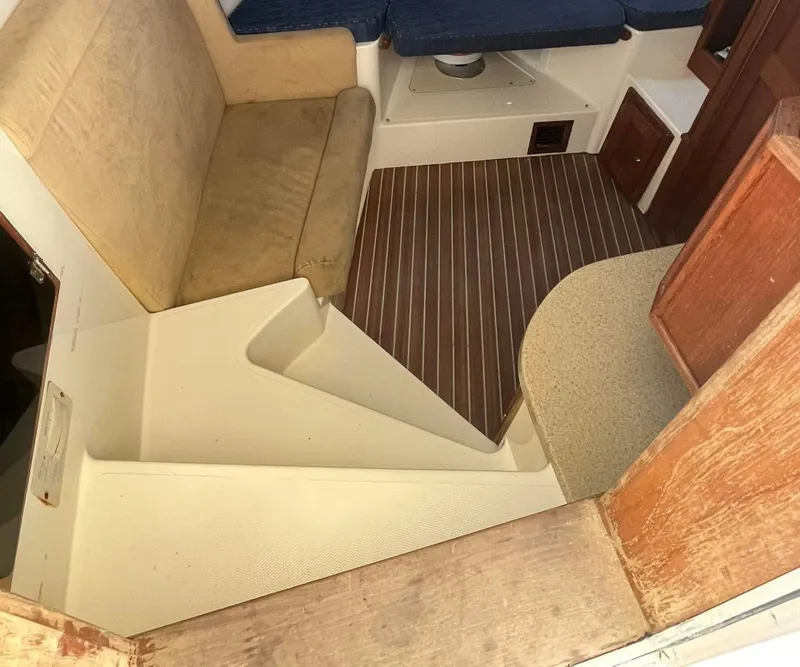 Slide: The Image of Interior of 2005 Albemarle 310 Sport Fisherman with seating and wood flooring. - 5