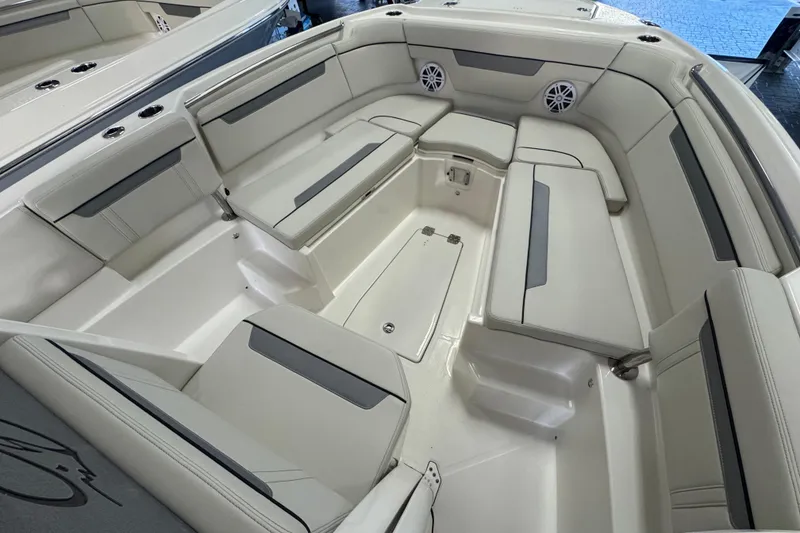 Slide: The Image of 2026 Sailfish 252 CC boat interior with spacious seating and modern design. - 6
