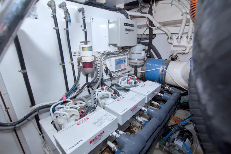 Slide: The Image of Engine room of 2005 Neptunus 62 Flybridge yacht with Dometic systems and wiring. - 112