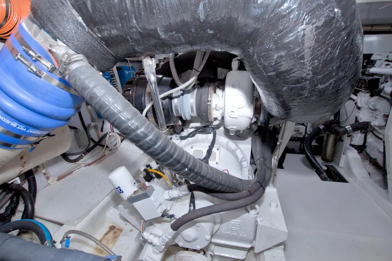 Slide: The Image of Engine room of 2005 Neptunus 62 Flybridge yacht, showcasing mechanical components. - 113